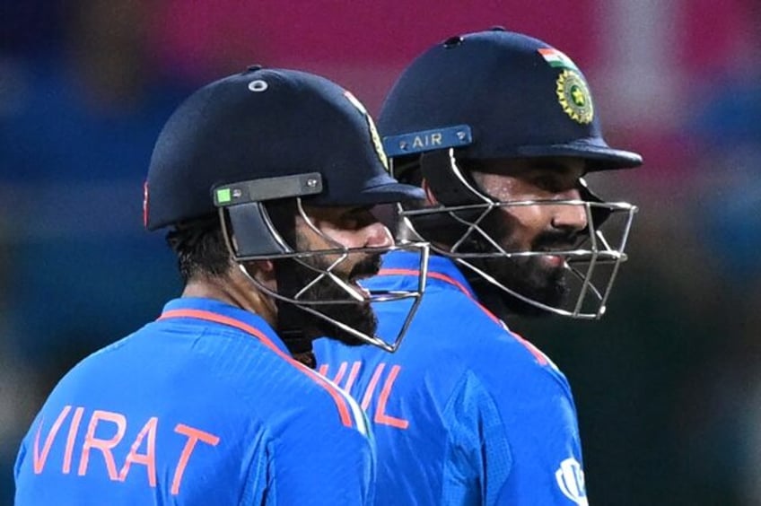 kohli rahul lead india out of peril to beat australia at world cup