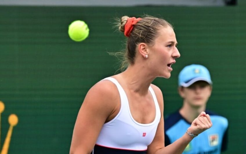 Ukraine's Marta Kostyuk celebrates a point on the way to victory over Russian Anastasia Po