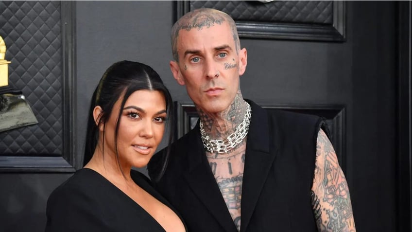 kourtney kardashian travis barker reveal life threatening emergency surgery saved unborn babys life