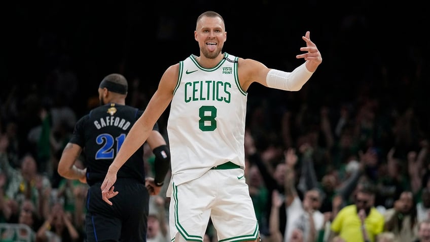 Kristaps Porzingis celebrates