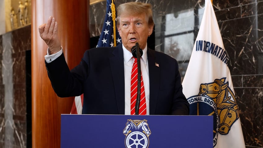 Republican presidential candidate and former U.S. President Donald Trump talks to reporters at the International Brotherhood of Teamsters headquarters on January 31, 2024 in Washington, DC. Trump met with leaders and members of the organized labor group while looking for union support after the United Auto Workers endorsed President Joe Biden's re-election campaign one week ago.