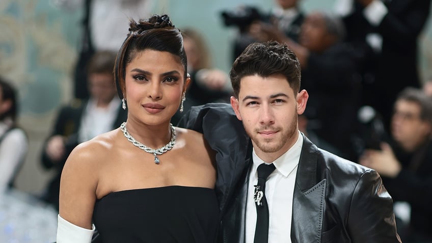 Priyanka Chopra Jonas and Nick Jonas posing together at the Met Gala