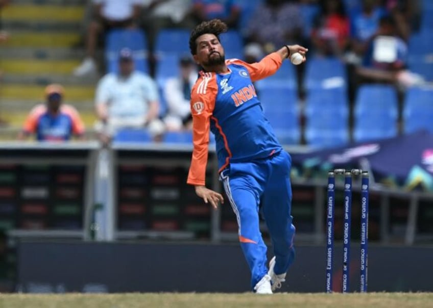 Wrist and reward: India's Kuldeep Yadav on his way to three wickets on Saturday