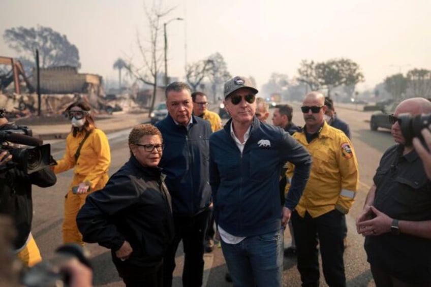 Los Angeles Mayor Karen Bass, seen here with California Governor Gavin Newsom, has denied