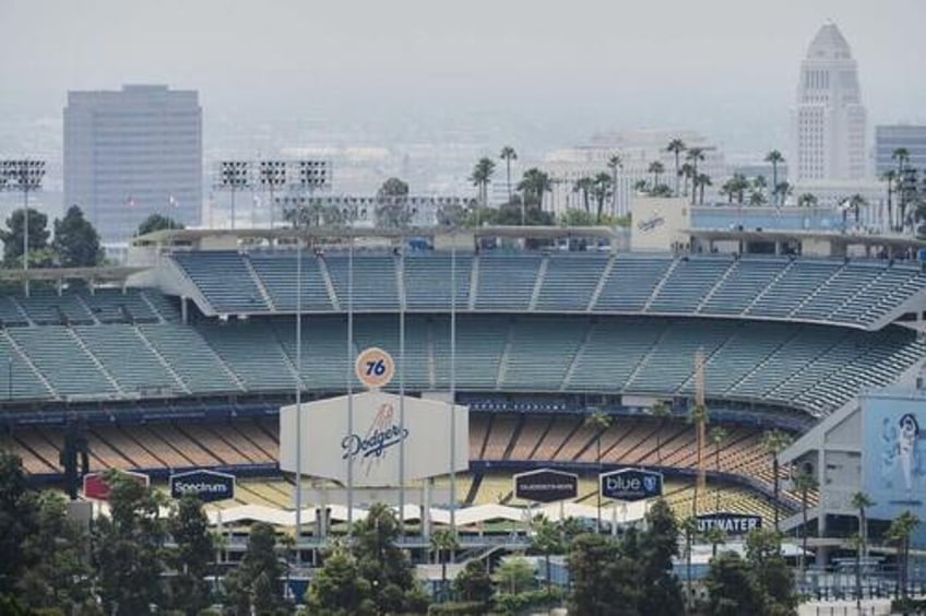 la dodgers pledge 1 million in aid to illegal immigrant families impacted by ice operations