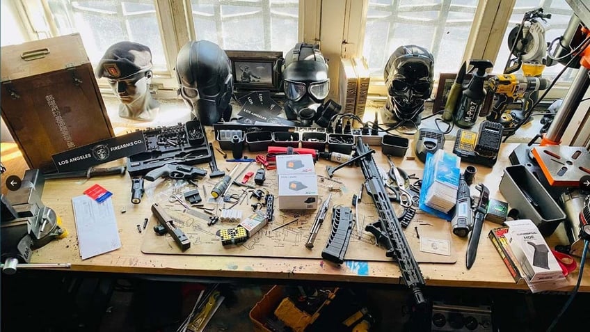 la man with heaps of riot gear apparent weapons factory in apartment out on bail