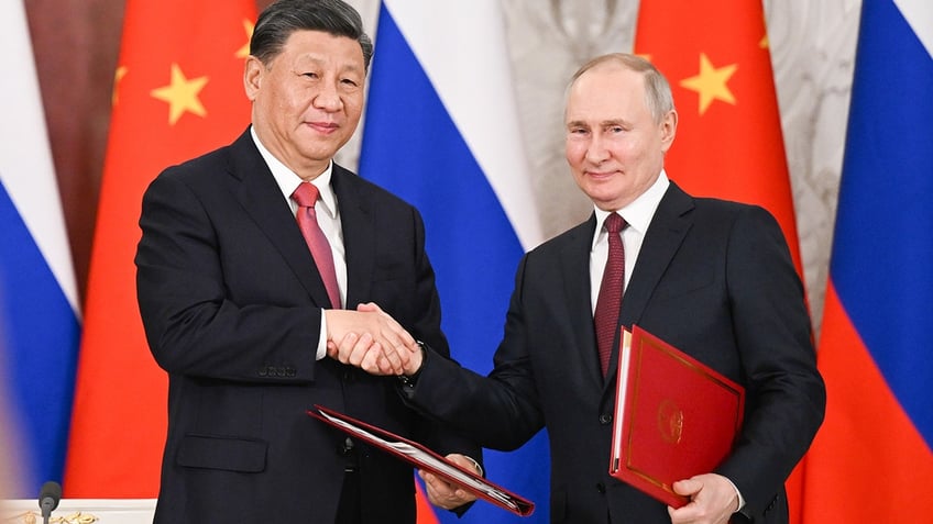 labeling china russia and iran as new axis of evil will not neutralize the threats they pose