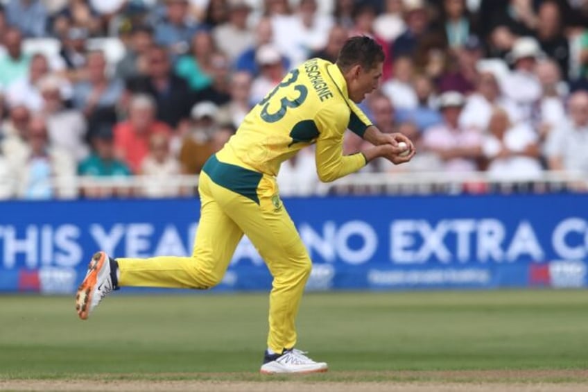 Australia's Marnus Labuschagne catches England's Ben Duckett off his own bowling during th