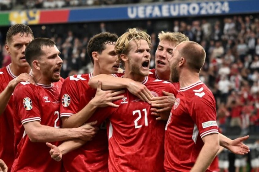 Morten Hjulmand's (centre) stunning strike brought Denmark level against England