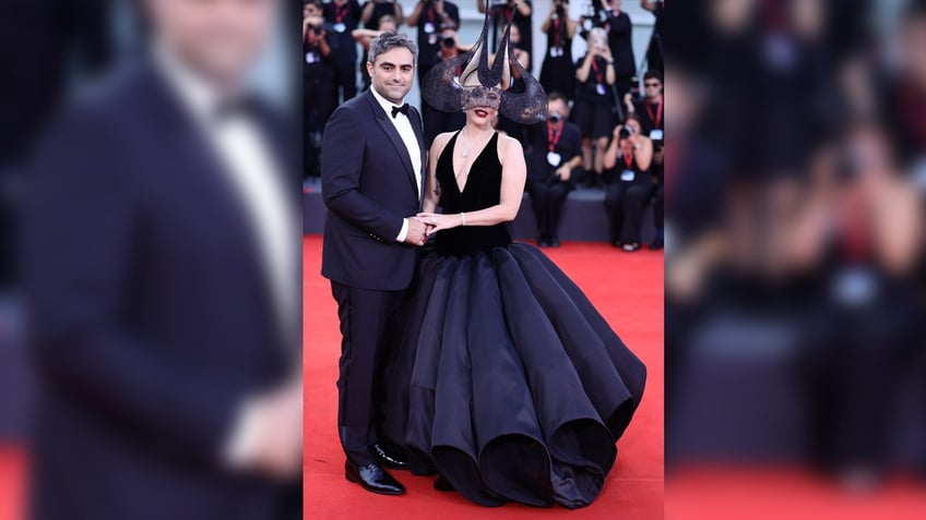 Actress Lady Gaga wears black dress at Venice Film Festival