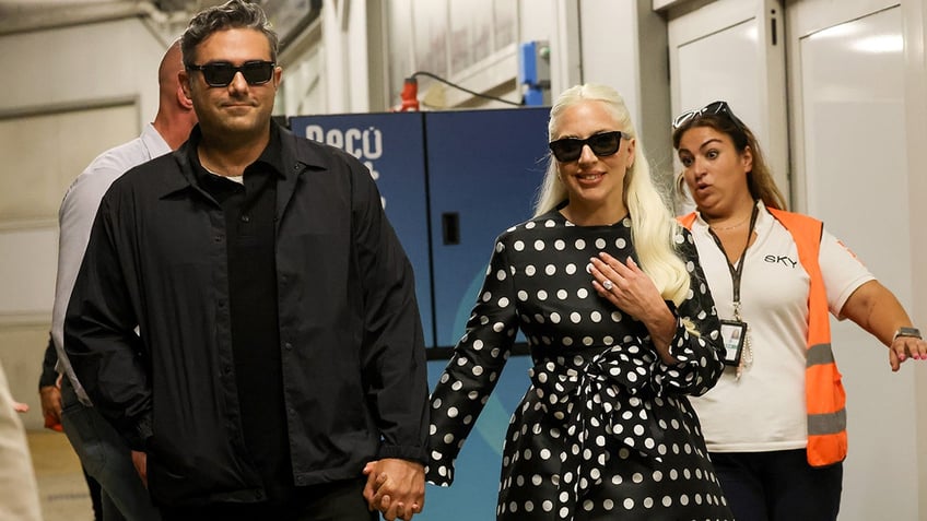 Lady Gaga flashes her engagement ring while walking with fiance Michael Polansky