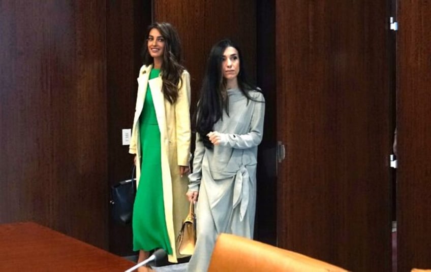 Attorney Amal Clooney (L), co-Founder is part of a legal team representing Nadia Murad (R)and some 430 Yazidi Americans in a suit against French company Lafarge