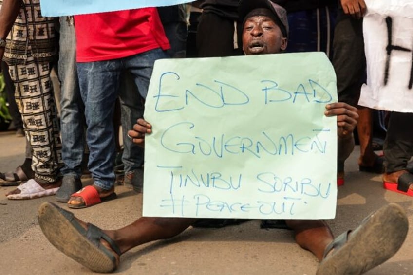 Demonstrators in the southern city of Ibadan carried signs saying 'End bad government', 'E