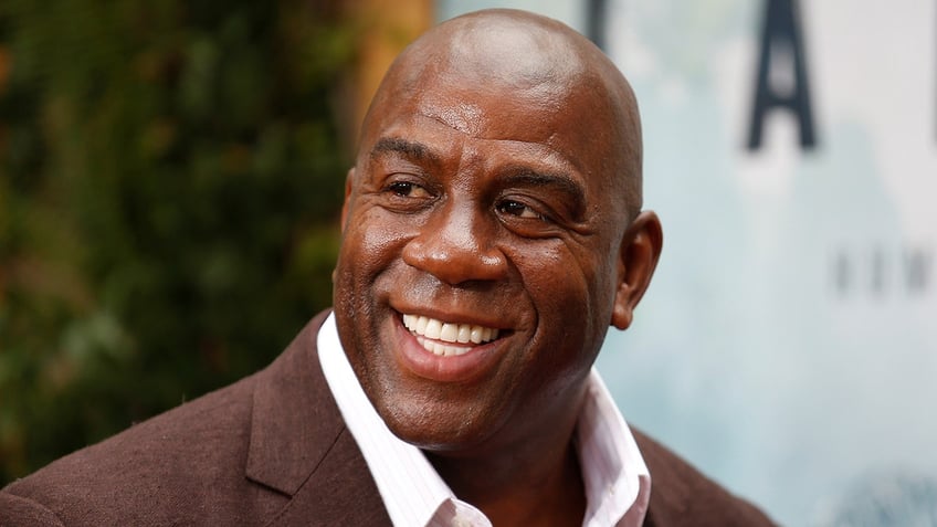 Earvin "Magic" Johnson smiles