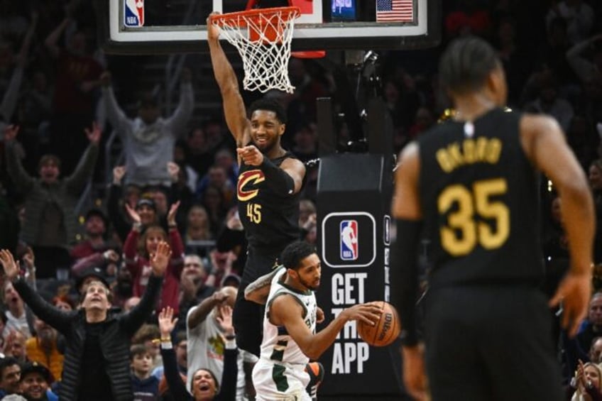 Cleveland's Donovan Mitchell celebrates after scoring in the Cavaliers' NBA victory over the Milwaukee Bucks