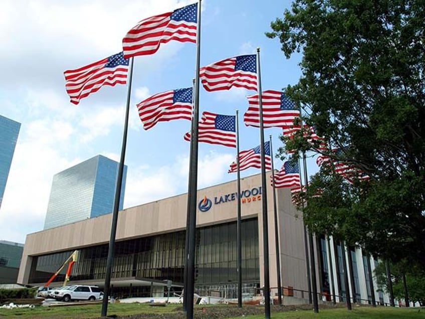 Flags fly in front of the Lakewood Church June 28, 2005 in Houston. Authorities are invest