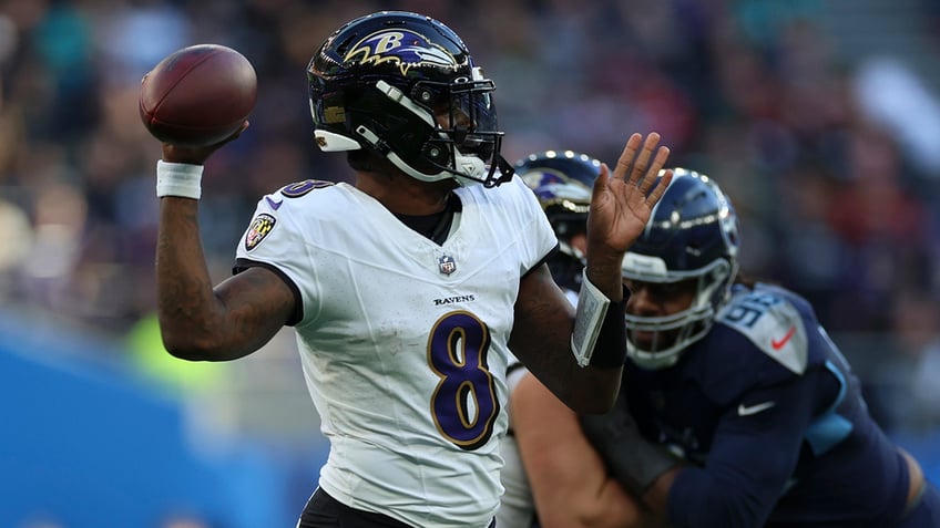 lamar jackson justin tucker help ravens eke out win over titans