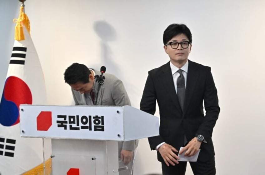 People Power Party leader Han Dong-hoon (R) announced his resignation Thursday after a bru