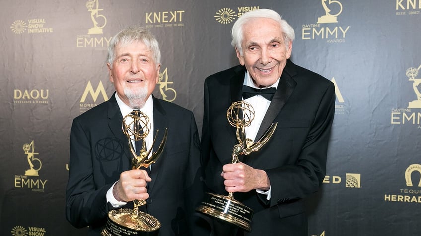 Sid and Marty Krofft holding their Emmys