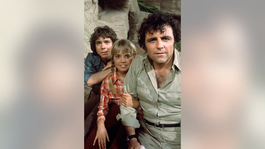 A close-up of the cast from Land of the Lost