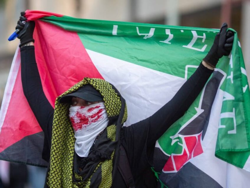 People demonstrate to mark one year of the war between Hamas and Israel in Los Angeles, on