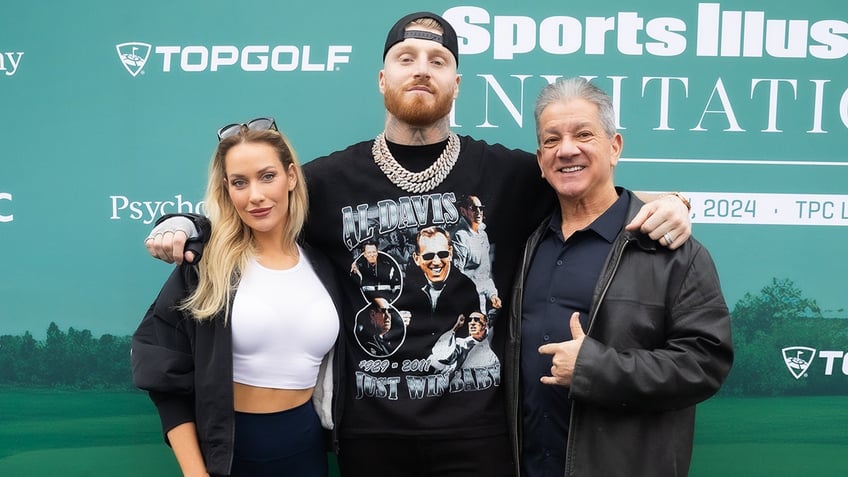 Paige Spiranac, Maxx Crosby and Bruce Buffer