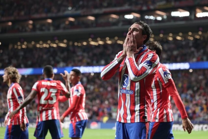 Jose Gimenez scored a 90th-minute headed winner for Atletico Madrid against RB Leipzig in