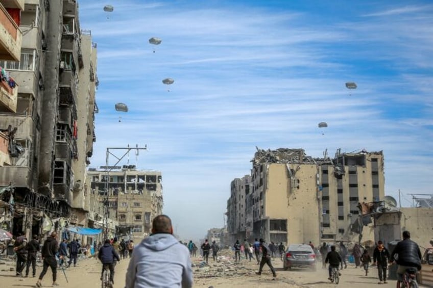 Foreign militaries have air dropped supplies over Gaza, sending a sea of humanitarian aid