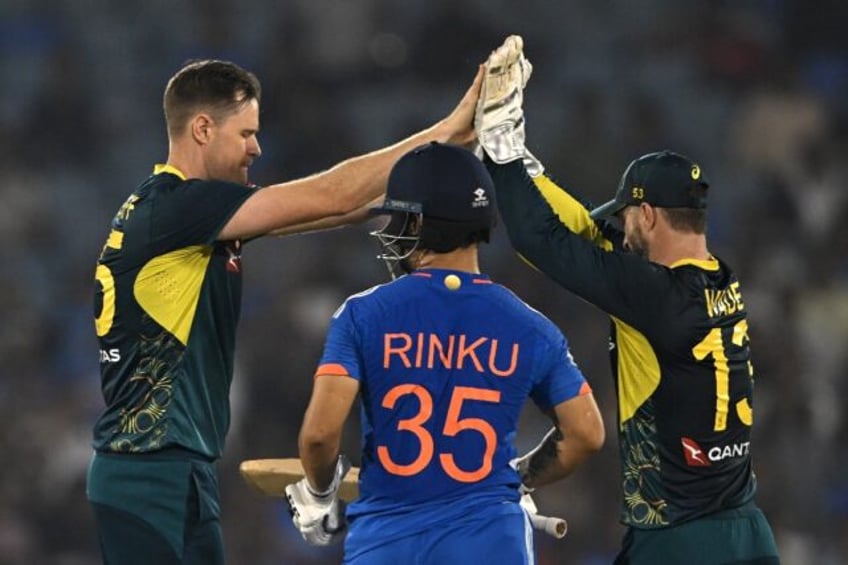 late wickets keep india to 174 9 in australia t20