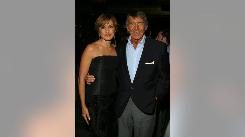 Mariska Hargitay posing with her father Mickey Hargitay