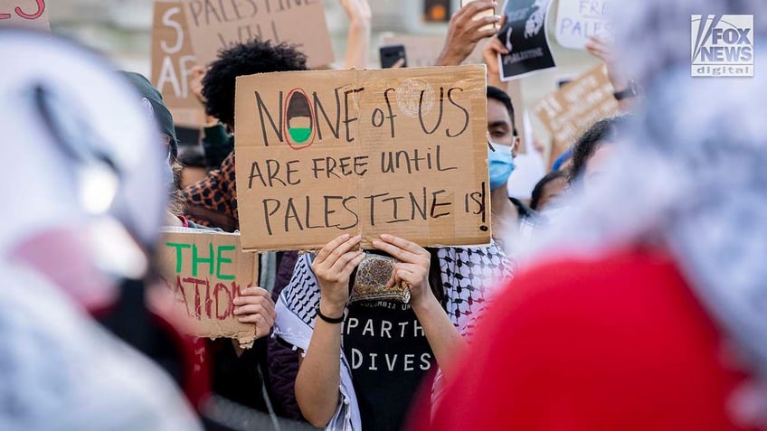 lawrence jones confronts anti israel protesters at nyc college over denials of hamas terror