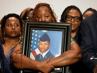 Lawsuit planned over Florida deputy’s shooting of US airman who was killed in his own home