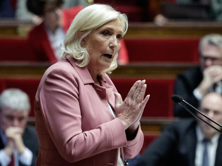 The President of the Rassemblement National parliamentary group Marine Le Pen speaks durin