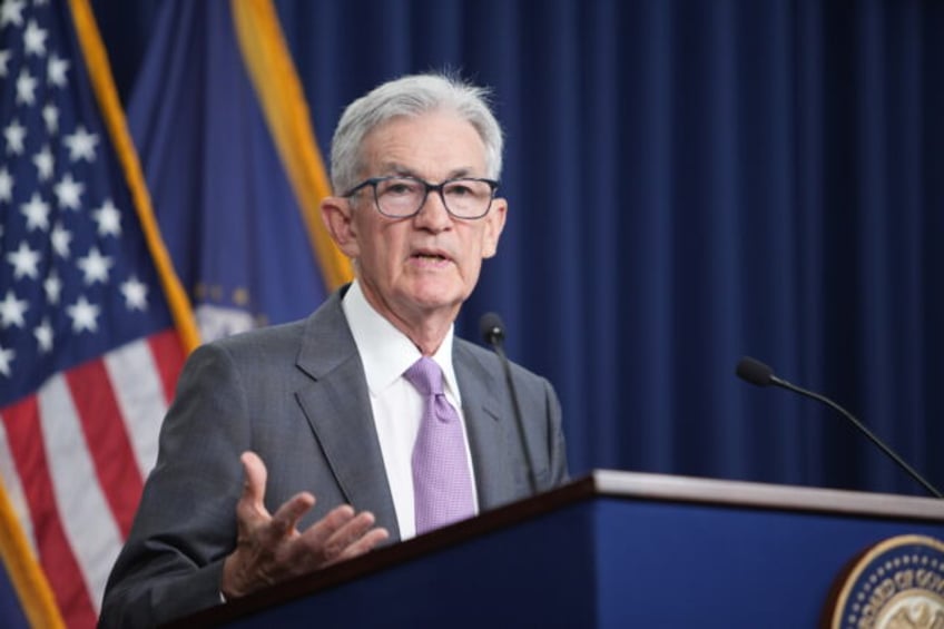 Chair Powell answers reporters' questions at the FOMC press conference on July 31, 20