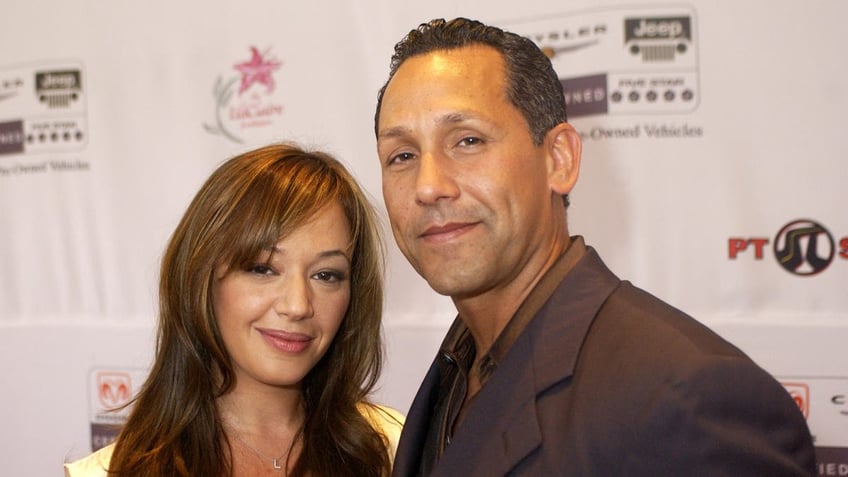 A photo of Leah Remini and Angelo Pagan