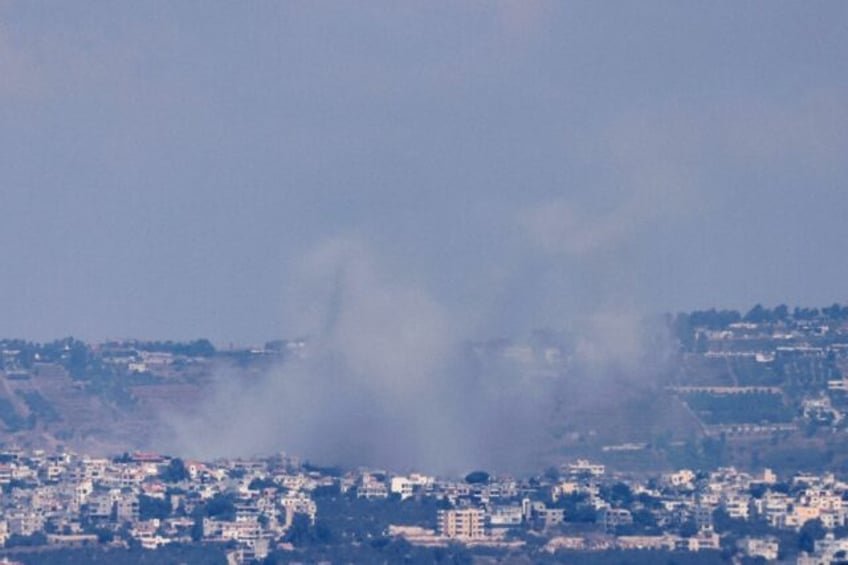 Some billows over the south Lebanon village of Khiam after an Israeli bombardment