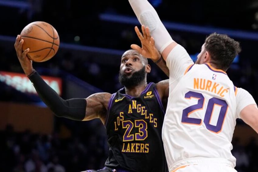 lebron james leads lakers to the in season tournament semifinals with a 106 103 win over suns