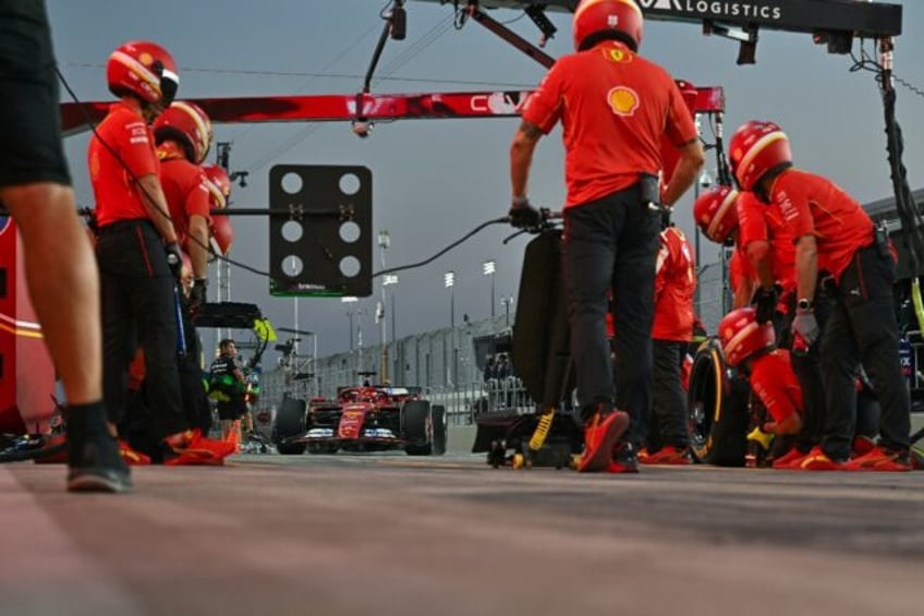 Ferrari's Charles Leclerc approaches for a pit stop during the first practice session of t