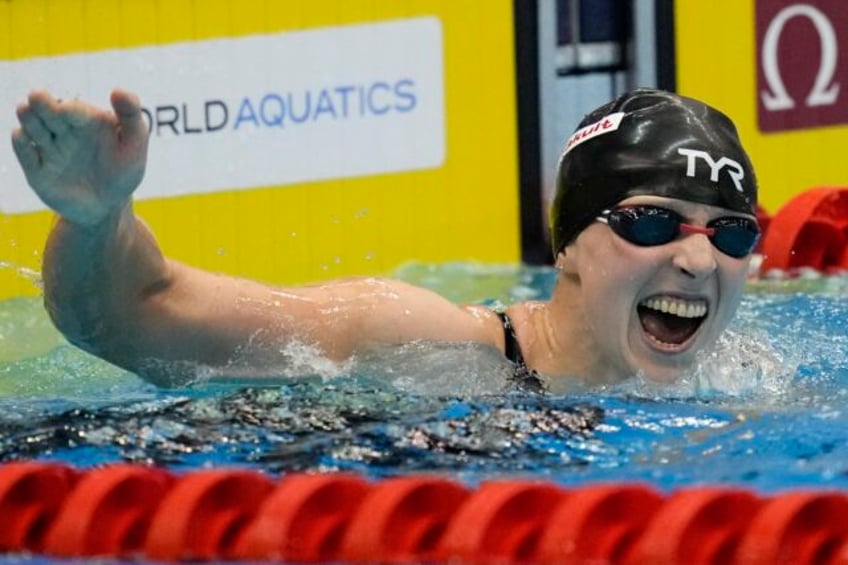 ledecky wins gold at the swimming worlds to tie mark set by phelps