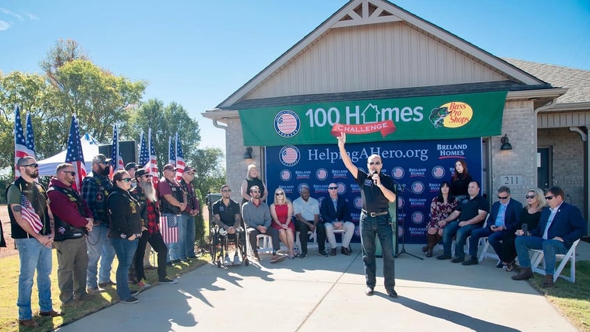 Lee Greenwood speaking at home reveal