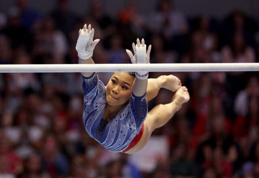 Reaching for gold: Suni Lee is returning to defend her Olympic crown after a career-threat