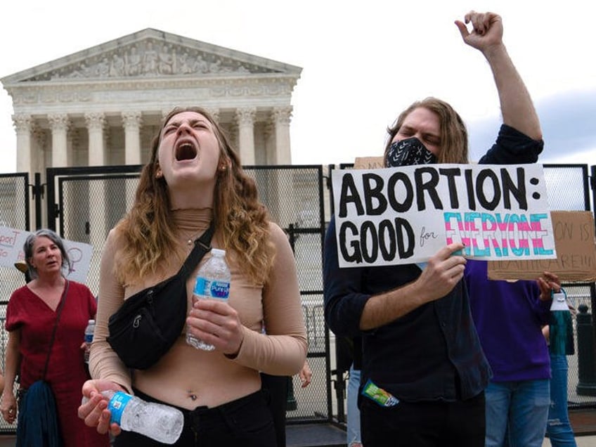 Abortion rights activist protest outside of the U.S. Supreme Court Thursday, May 5, 2022 i