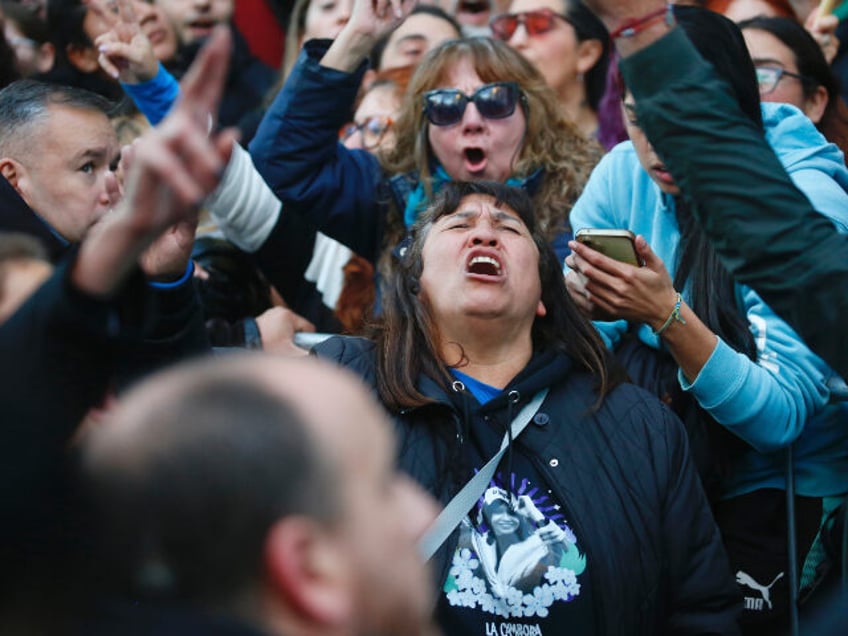 A supporters shouts slogans as waiting the Supreme Court of Argentina decision on former p