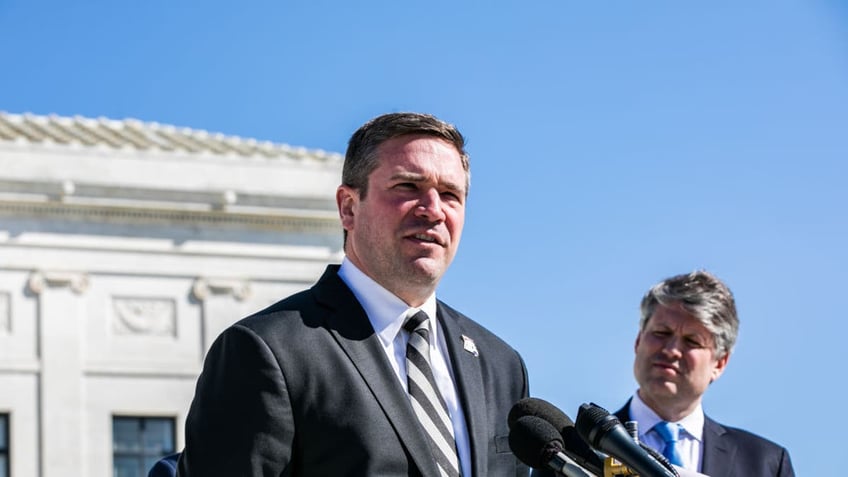 Andrew Bailey at outdoor news conference