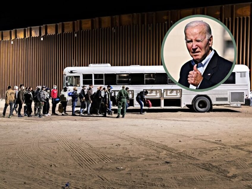 YUMA, ARIZONA - DECEMBER 08: U.S. Border Patrol agents load immigrants into a bus for transport to a detention facility on December 08, 2021 through the city of Yuma, Arizona. Immigration officials were overwhelmed processing thousands of new arrivals, with many families trying to reach U.S. soil before the court-ordered …