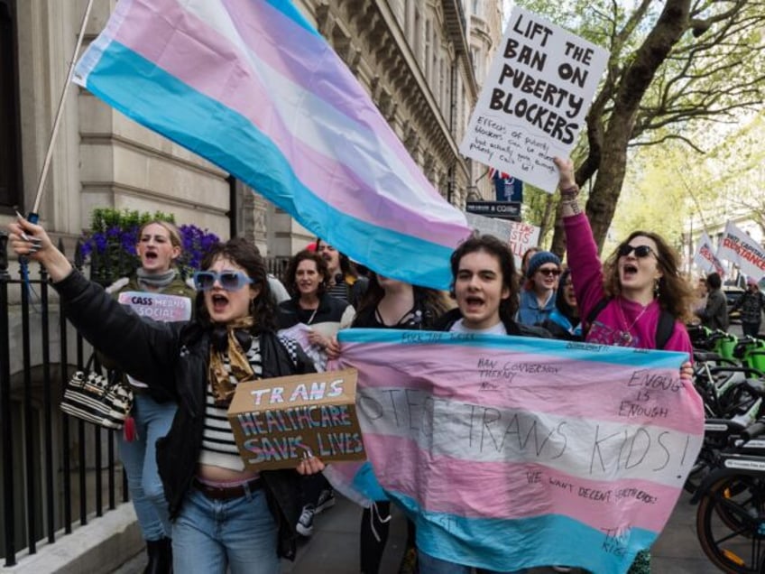 LONDON, UNITED KINGDOM - APRIL 20, 2024: Transgender people and their supporters march thr