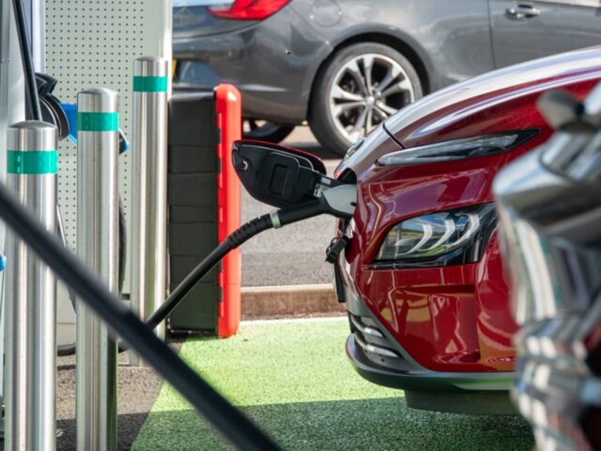 SAINT AUSTELL, UNITED KINGDOM - AUGUST 14: Cars recharge at a charging station for electri