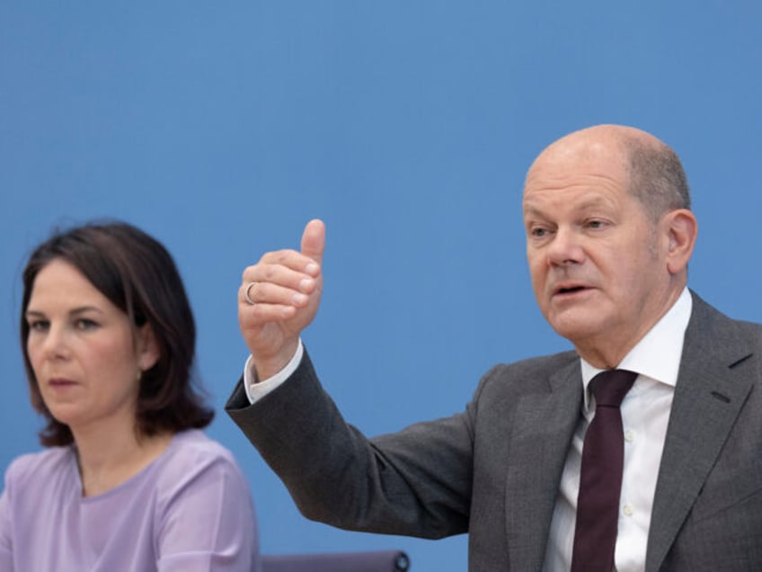 BERLIN, GERMANY - JUNE 14: German Chancellor Olaf Scholz speaks next to Foreign Minister A