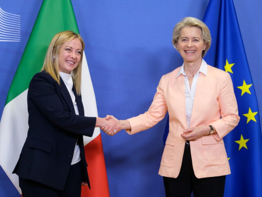 BRUSSELS, BELGIUM - NOVEMBER 3: Italian Prime Minister Giorgia Meloni (L) is welcome by th