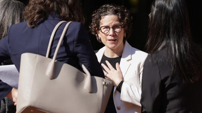 Attorney Karen Dunn of Google’s defense team leaves a federal courthouse in Alexandria, Virginia, last month. The Justice Department is charging Google in an antitrust case challenging practices in its ad-tech business.